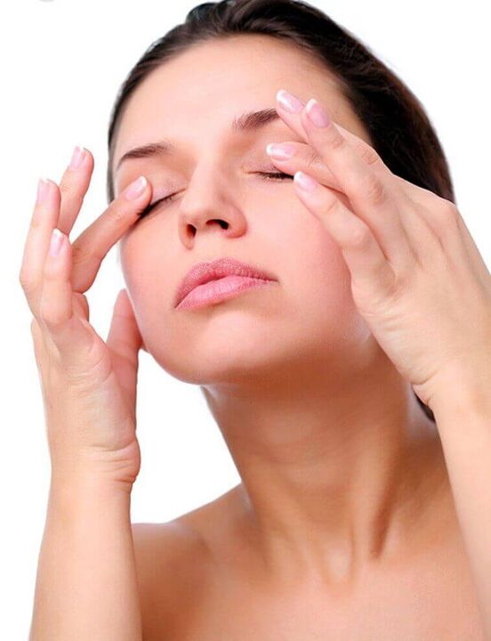 massage of the skin around the eyes for rejuvenation